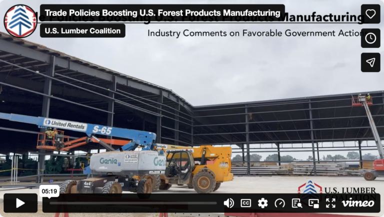Partially constructed industrial building with cranes, lifts, and construction equipment. Banner at top discusses U.S. forest products manufacturing and government actions.
